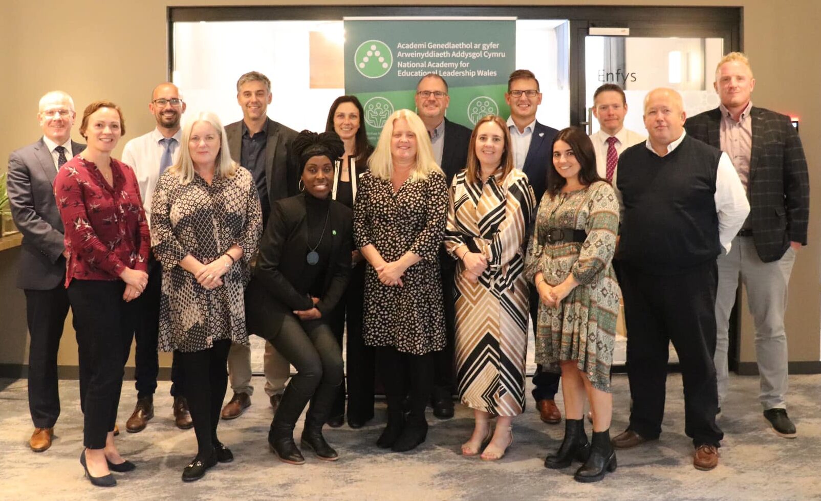 A group of people posing for a photo. A picture of our new Associates who will form Cohort 6